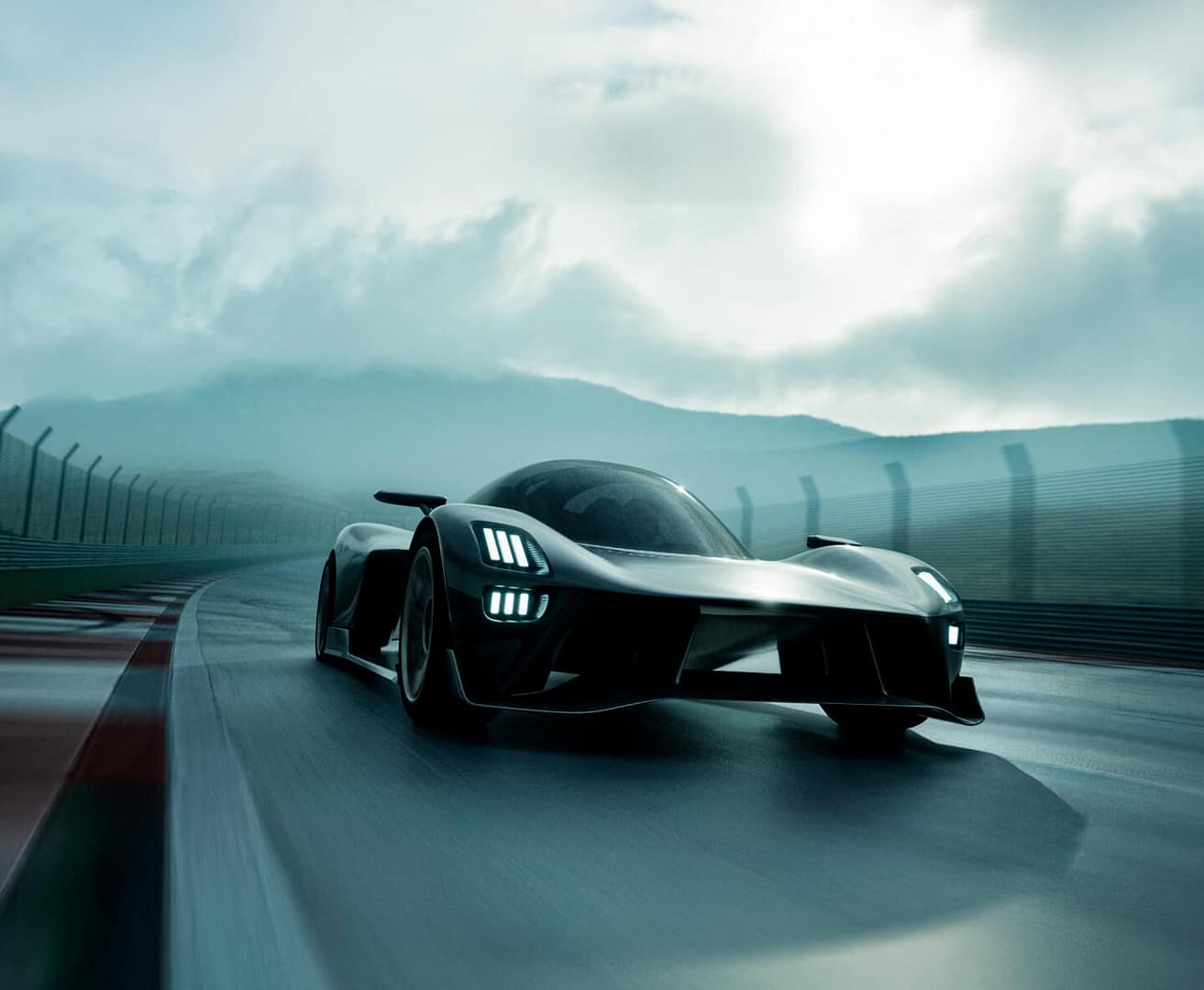 A sleek, futuristic sports car races along a wet, foggy track with mountains in the background. The car's headlights are on, and the scene conveys speed and advanced design.