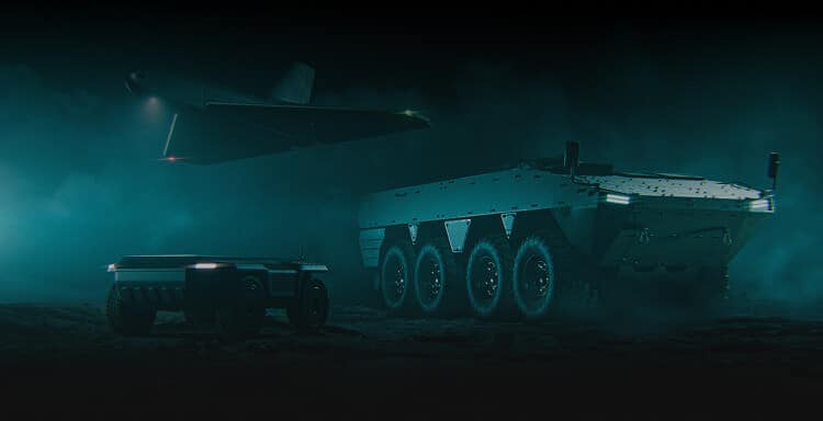 A futuristic scene shows a large armored vehicle, a smaller unmanned ground vehicle, and a drone flying above, all moving through a dark, smoky environment with blue-green lighting.