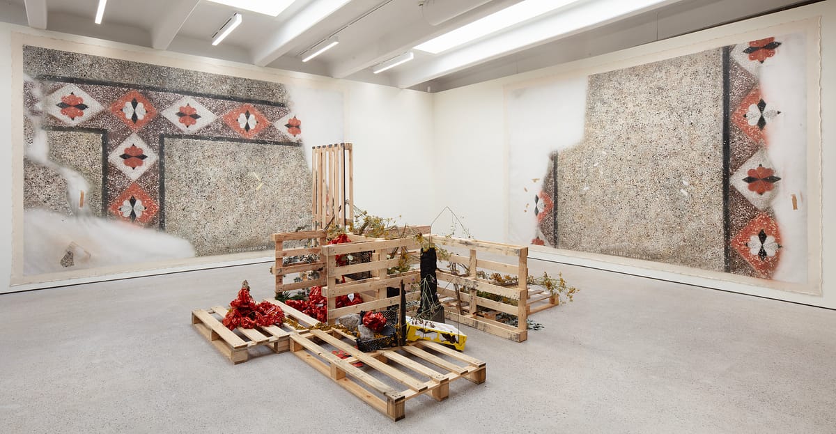 Installation view with Floor of the Great Synagogue of Vilna: Thinking about Father, 2014–26 by Eglė Ridikaitė and What Hands Give, What Grounds Keep, 2026, by Hedy Leung. Photo: Jussi Tiainen