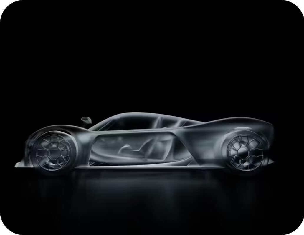 A translucent, futuristic sports car is shown in profile against a black background, revealing the car’s sleek interior and aerodynamic design.