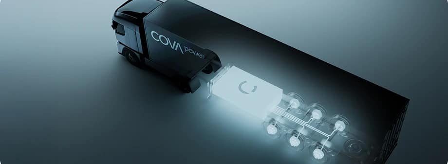 A black semi-truck with "COVApower" written on the cab is shown in a top-down view. The truck’s trailer is partially transparent, revealing a glowing, high-tech battery system inside.