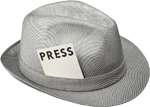 A gray fedora hat with a white press card tucked into the hatband, signifying a traditional journalist or reporter's accessory.