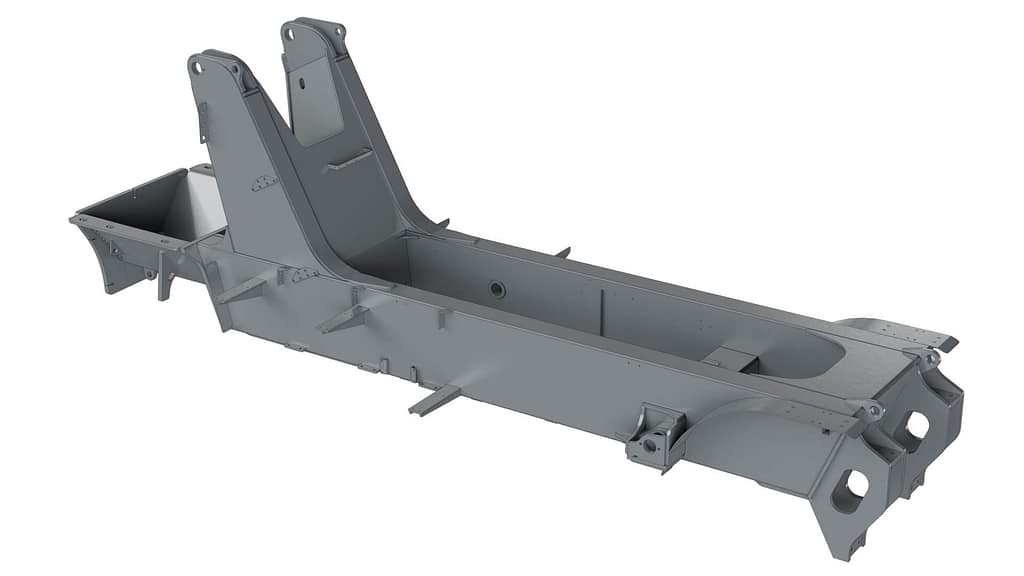 A gray, metallic automotive chassis frame with reinforced sections, cutouts, and mounting points, designed to support the structure and components of a vehicle.