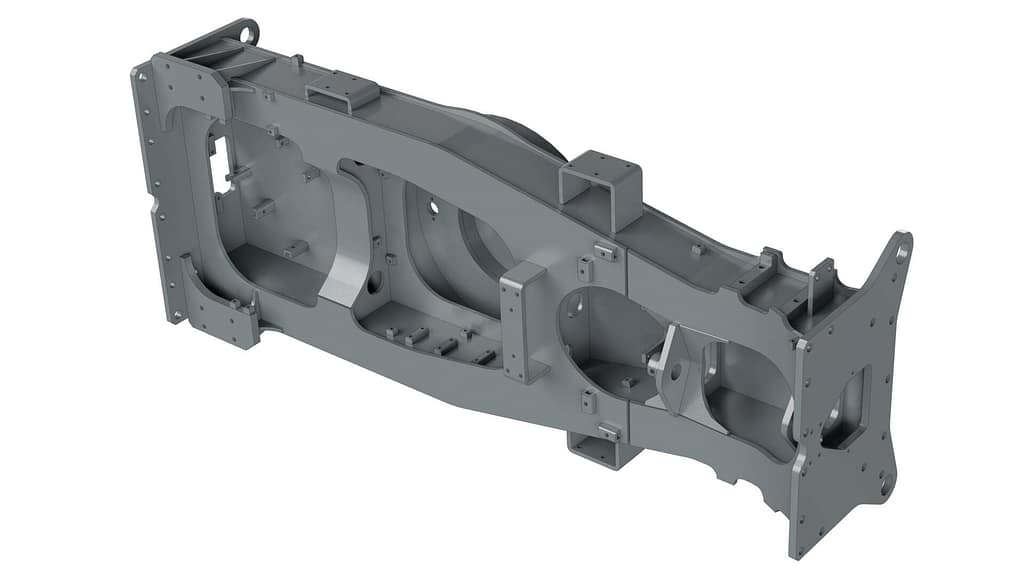 A 3D-rendered image of a large, gray, rectangular metal frame with several cutouts, mounting points, and structural reinforcements, likely a component for heavy machinery or industrial equipment.