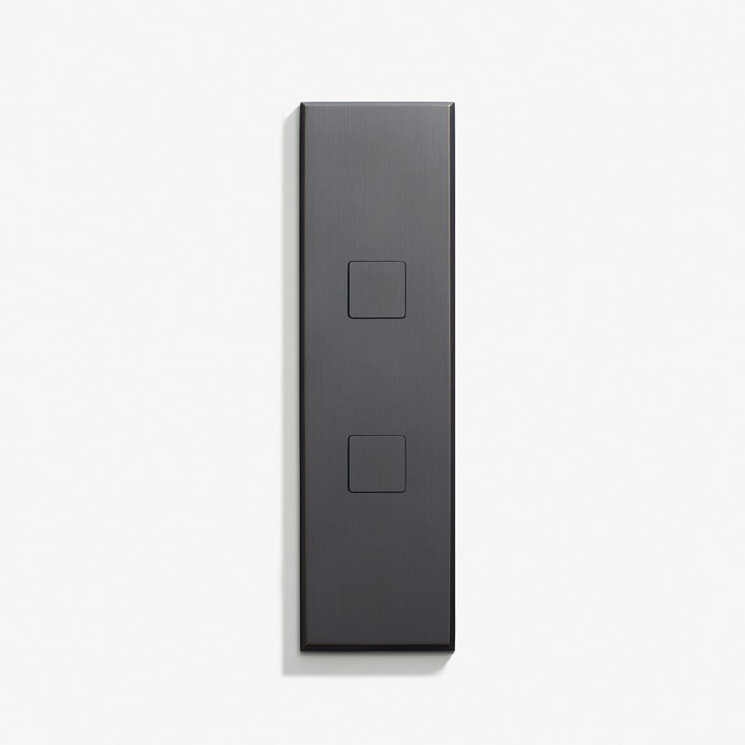 A black wall plate on a white background.