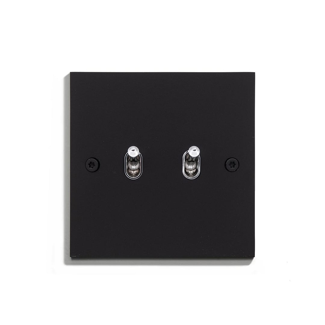 Two black switches on a white background.