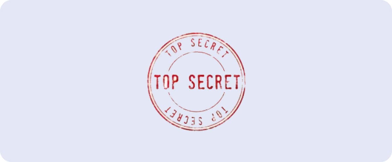 A red circular "TOP SECRET" stamp appears in the center of a light blue background. The words "TOP SECRET" are repeated along the border of the circle.