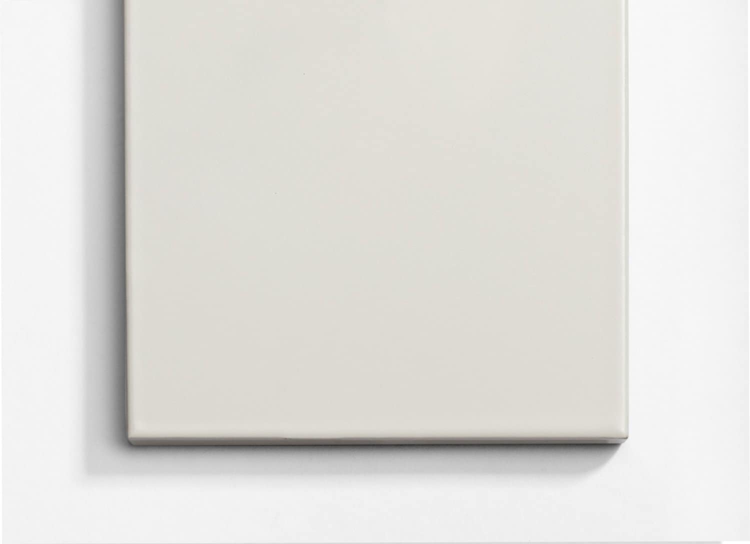 A white square on a white wall.