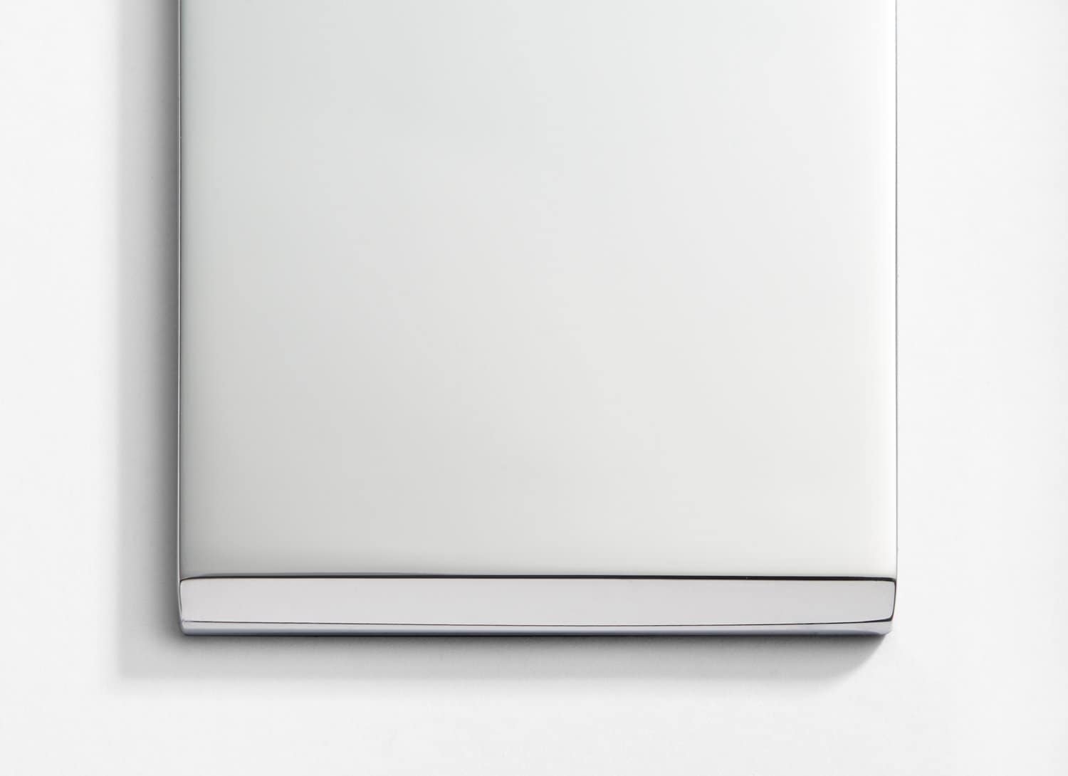 A white box on a white surface.