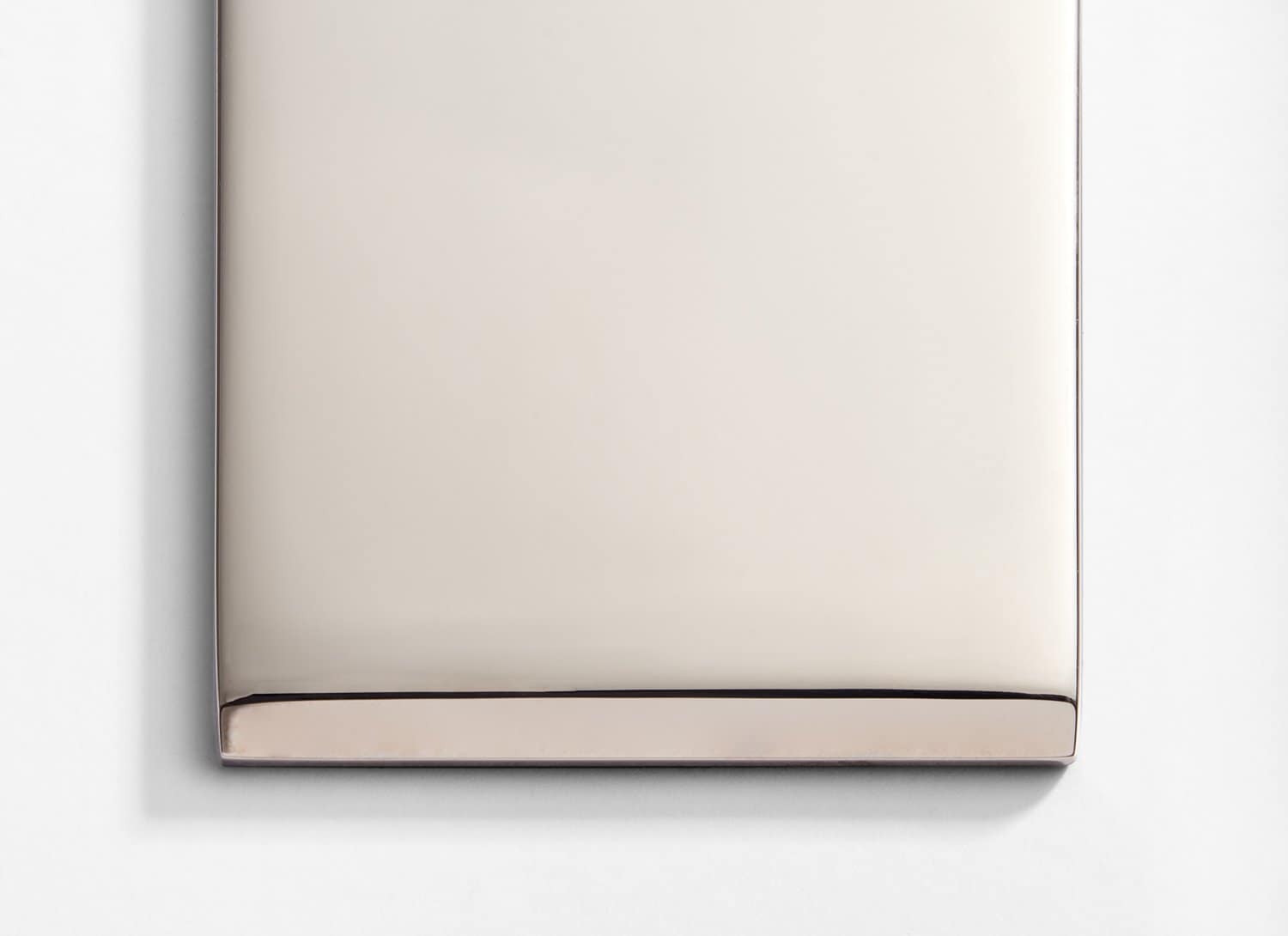 A close up of a silver plate.