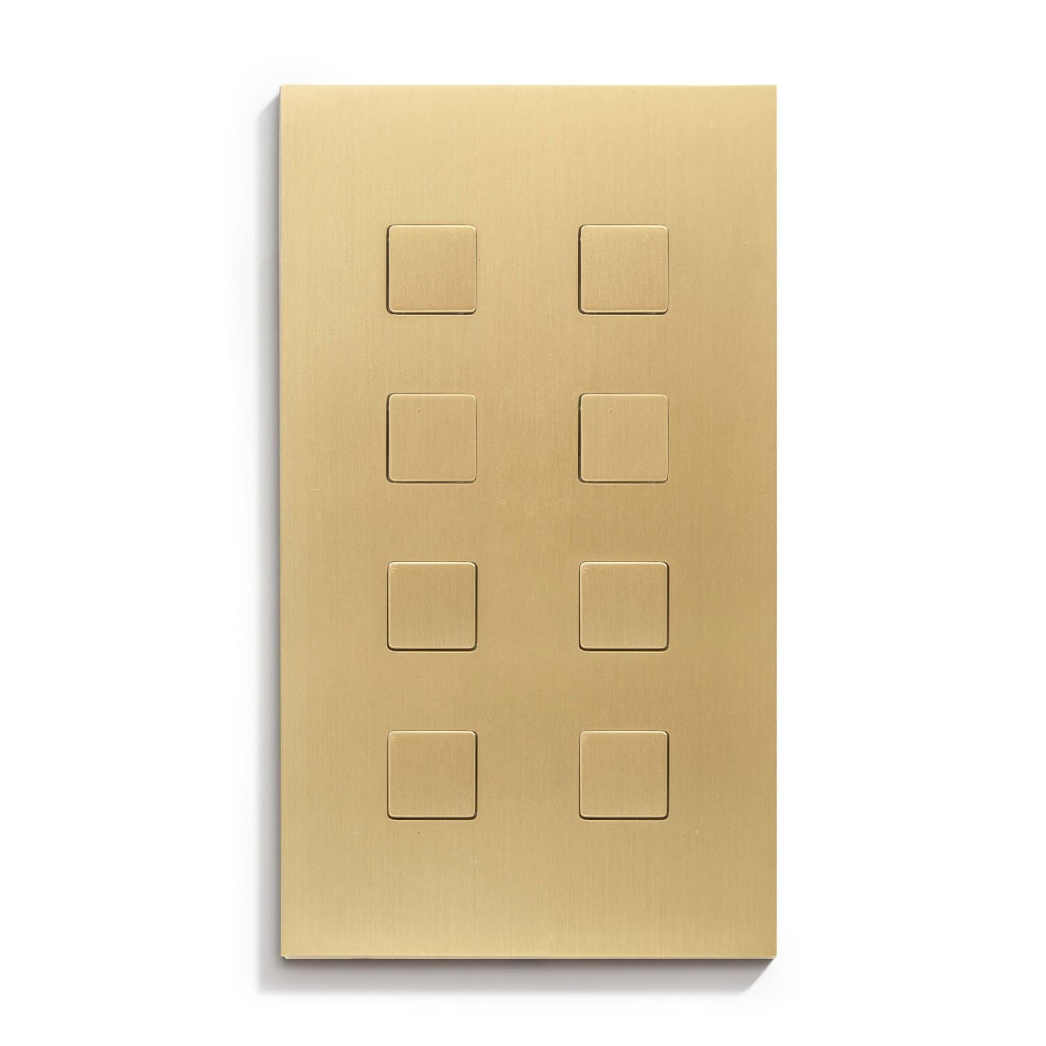 A brass plate with four squares on it.