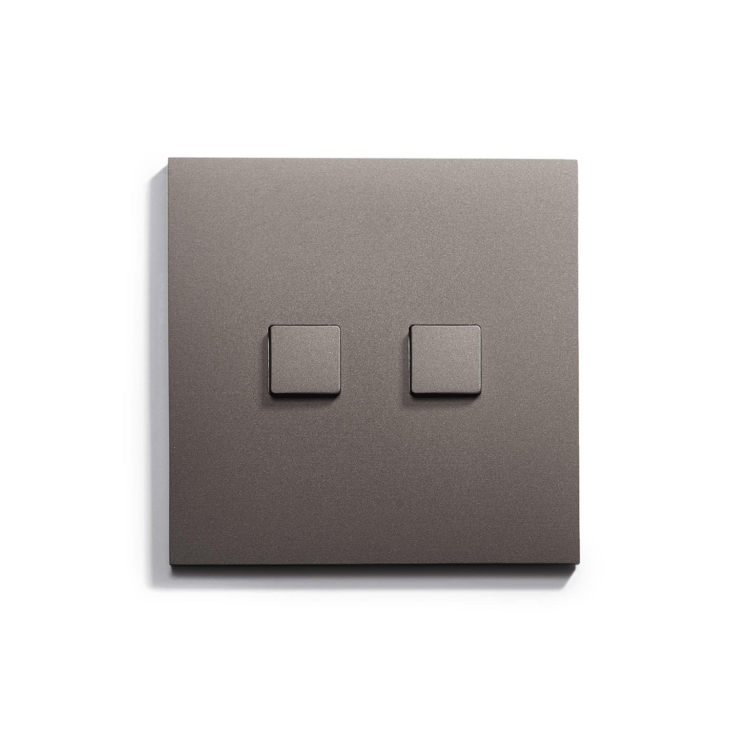 A light switch with two squares on a white surface.