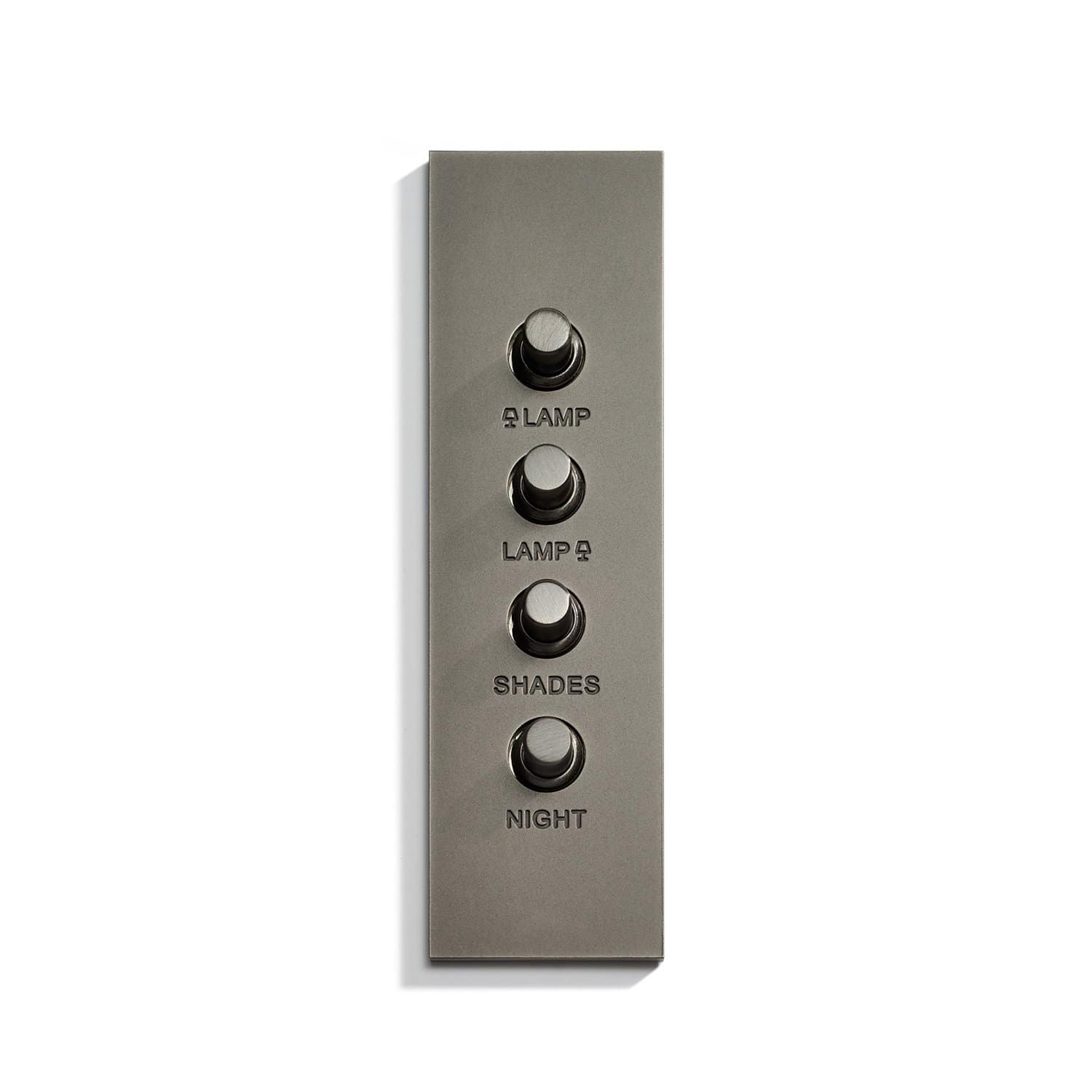 A wall plate with four buttons on it.