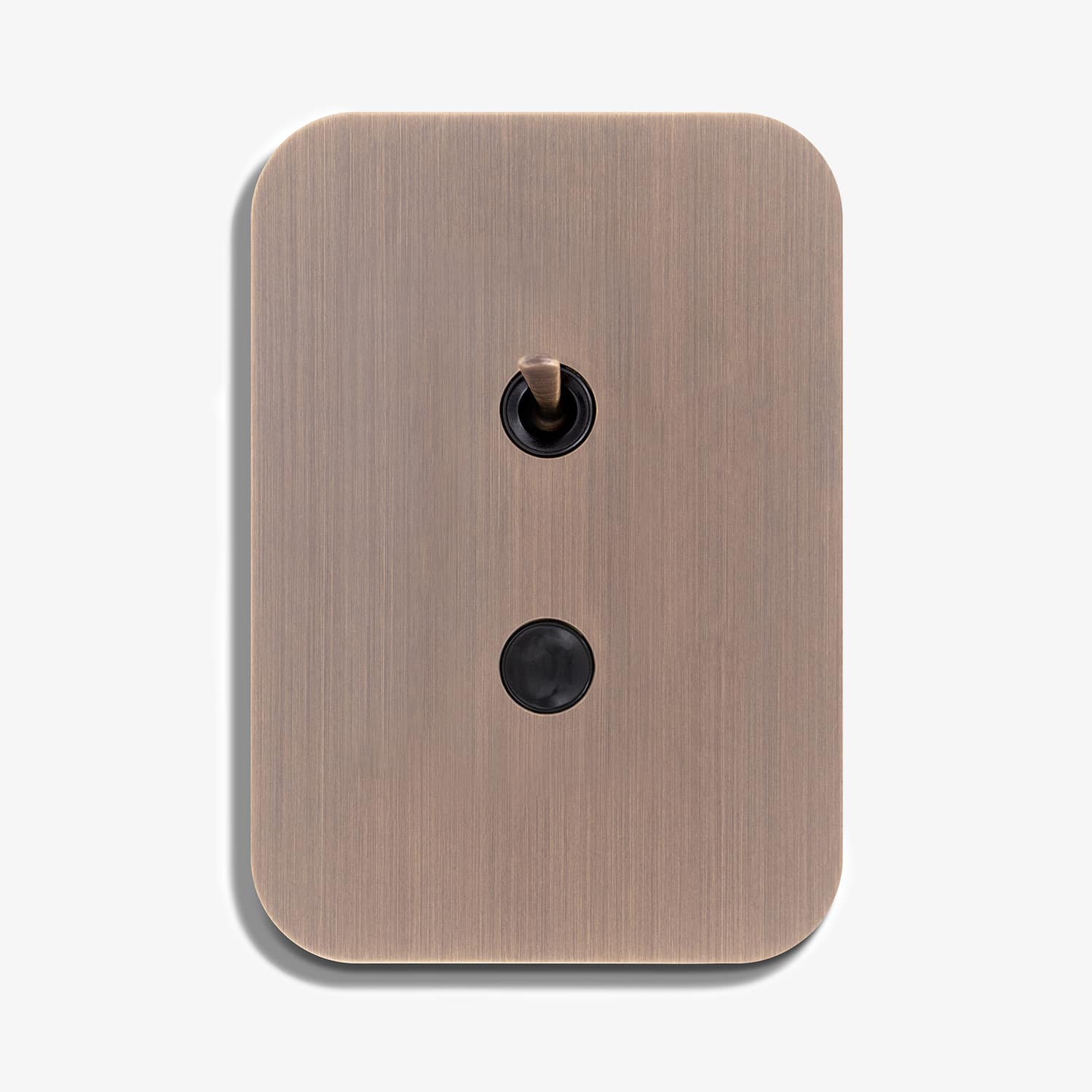A light switch with a black button on it.