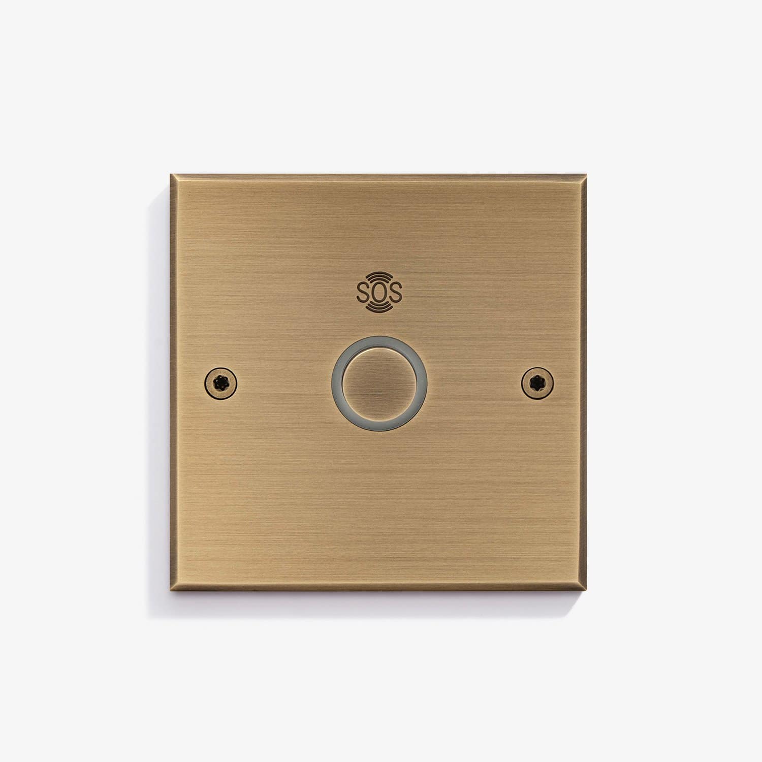 Elegant gold-toned emergency sos button mounted on a wall.