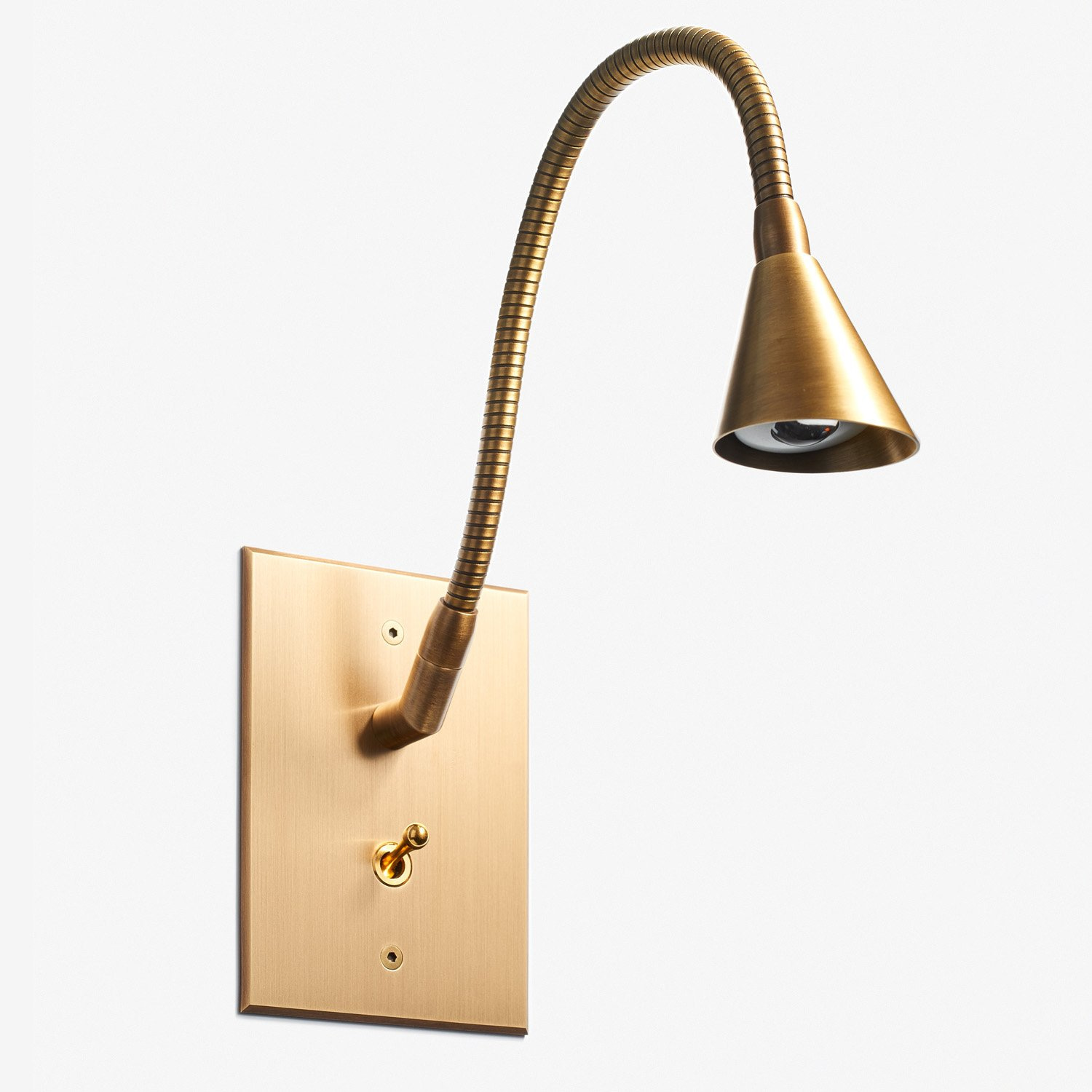 Flexible brass wall lamp with a conical shade and adjustable gooseneck attached to a square backplate with a switch.