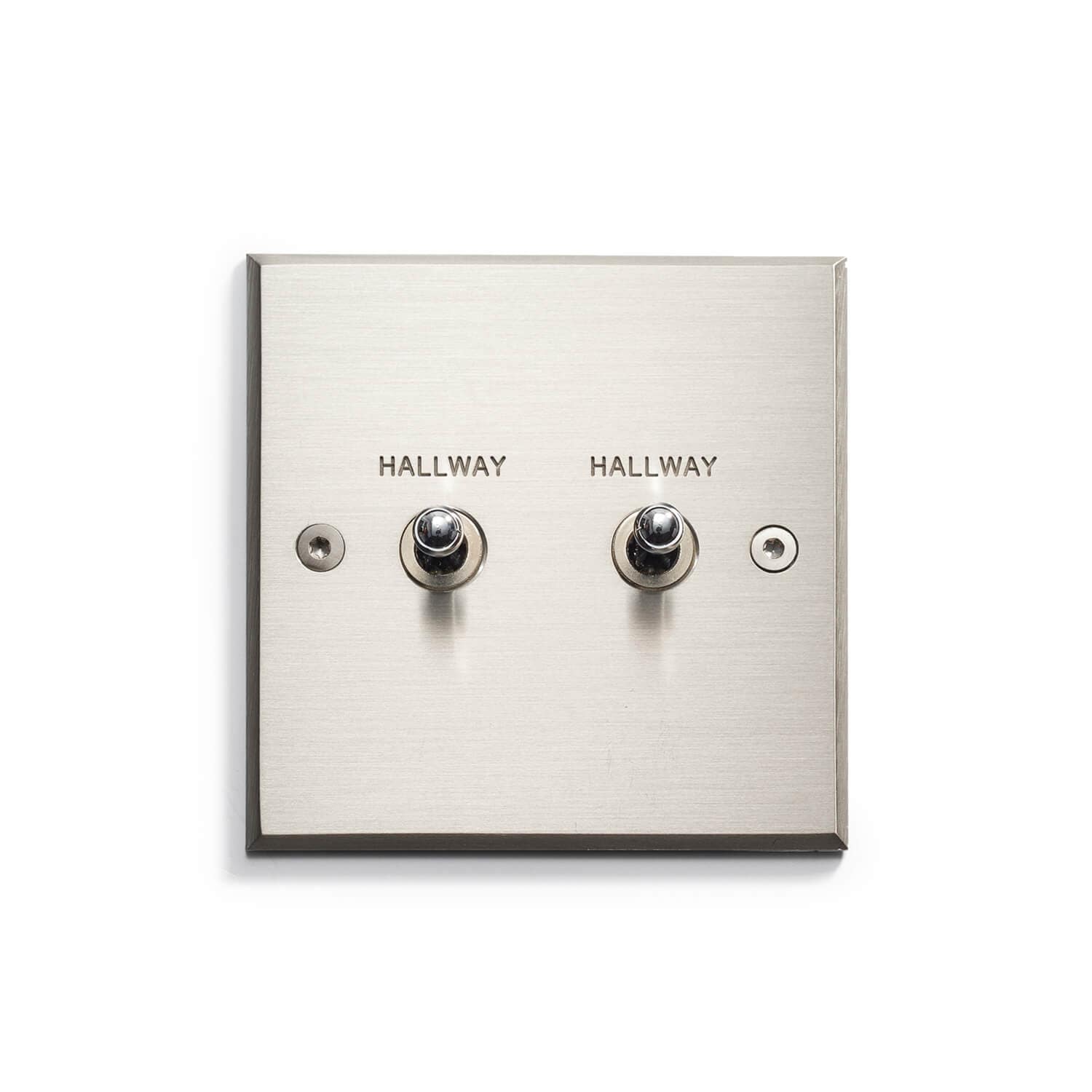 A silver square with three switches.