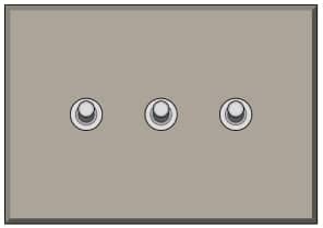 A three-gang light switch panel with three toggle switches. The panel is a neutral beige color, and each switch is centered horizontally and vertically aligned. The switches are in their default off positions.