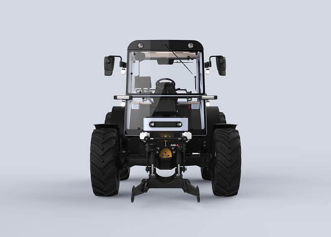 Front view of a black and silver tractor with large tires, side mirrors, and a clear windshield, set against a plain light gray background.