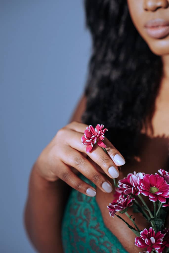 A woman holding flowers in her hands